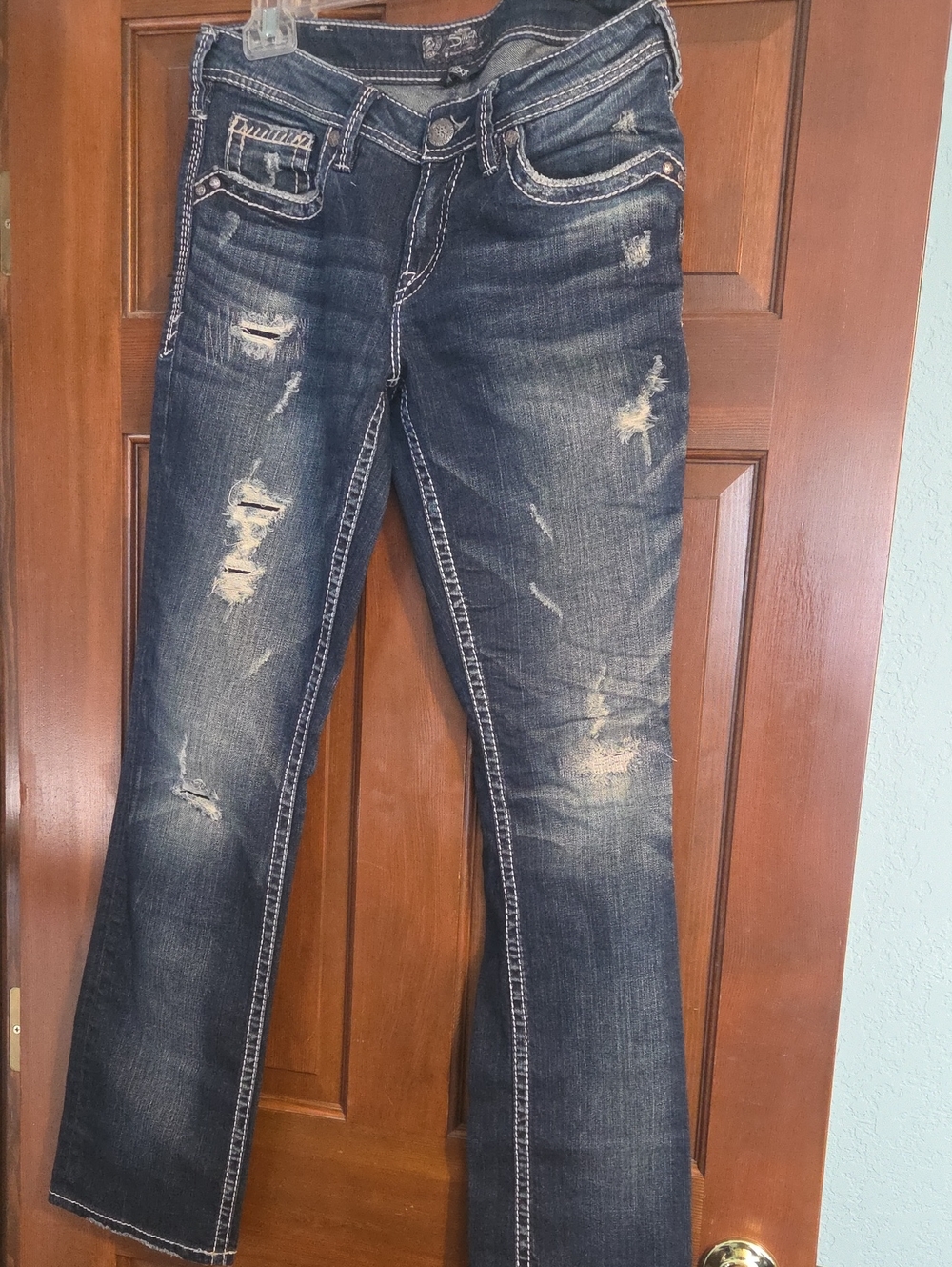 Silver Jeans Women's Distressed Flare Jeans in Dark Indigo